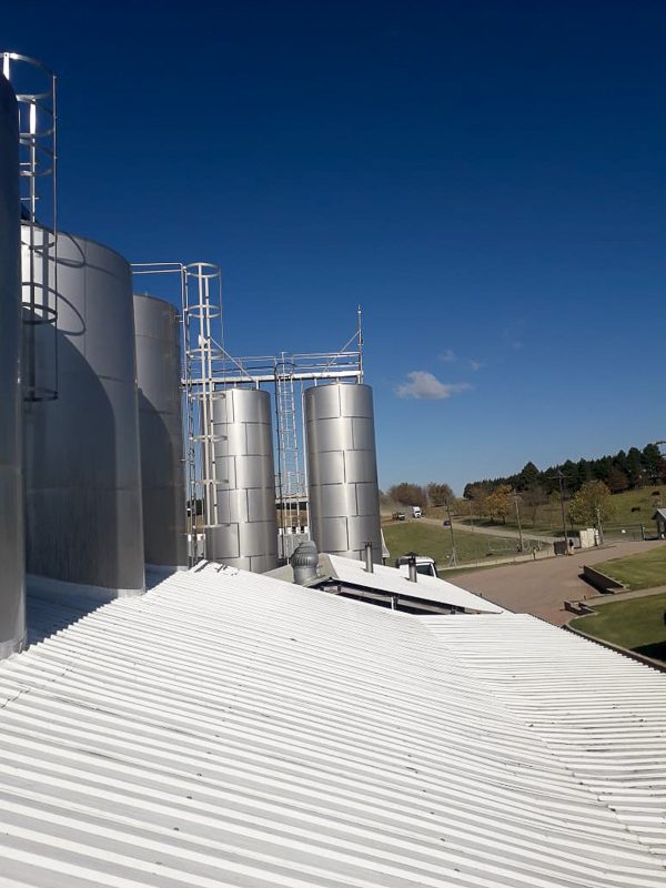 Silos installed on-site using expert rigging and cranage, showcasing safe heavy lifting and precise placement of large industrial storage systems in South Africa.