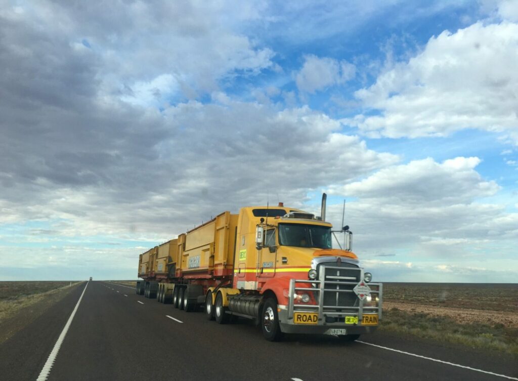 Low bed transportation of oversized industrial equipment, showcasing expert rigging, logistics, and heavy haulage solutions in South Africa.